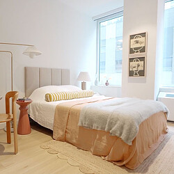 A bed in a room.